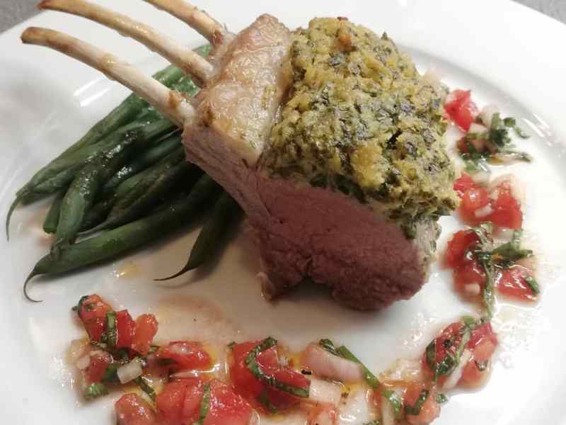 Herb crusted rack of lamb with tomato salsa